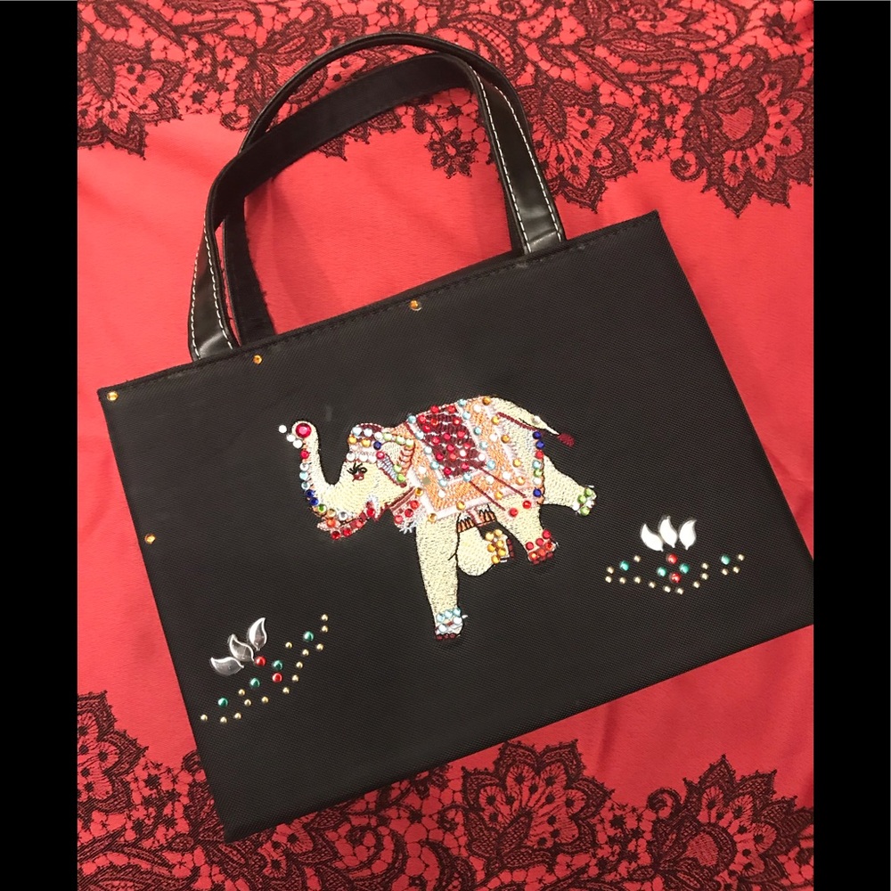 Adorable black fabric bag with jeweled elephant